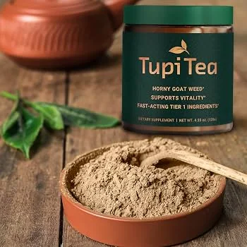 Tupi Tea powder in a bowl beside the jar and a wooden spoon, showing how the daily tea is prepared